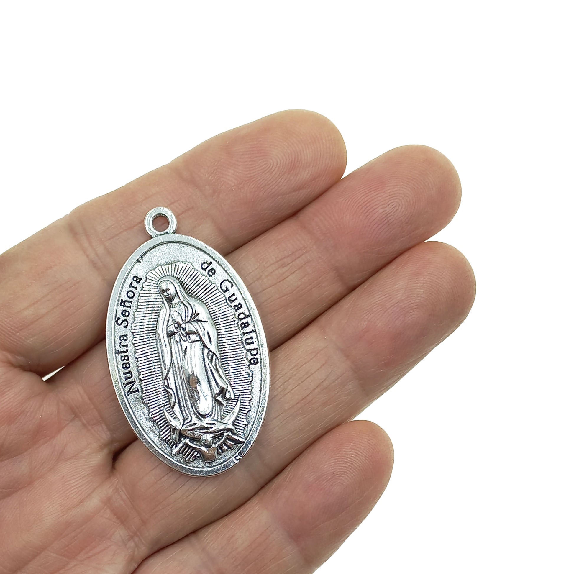 Colgante Virgen de Guadalupe con Divino Niño por Unidad.