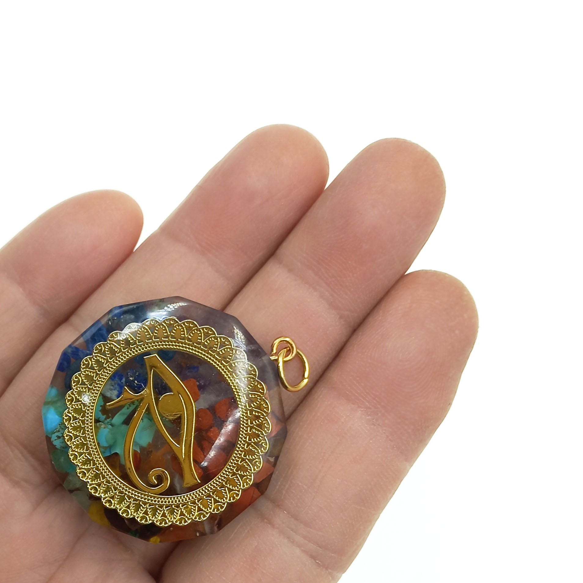colgante ojo de horus orgon dorado