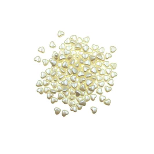 Cuenta Corazon Color Crema 9mm.