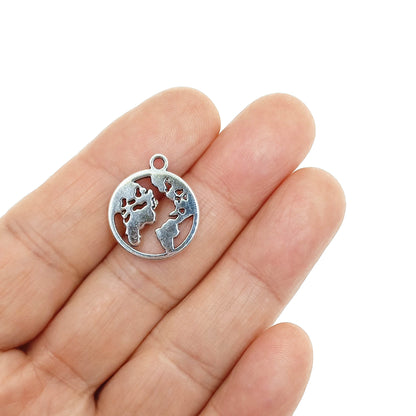 dije planeta tierra mano